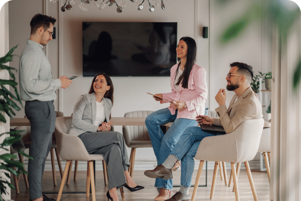 A group of professionals collaborating during a meeting in a modern office.